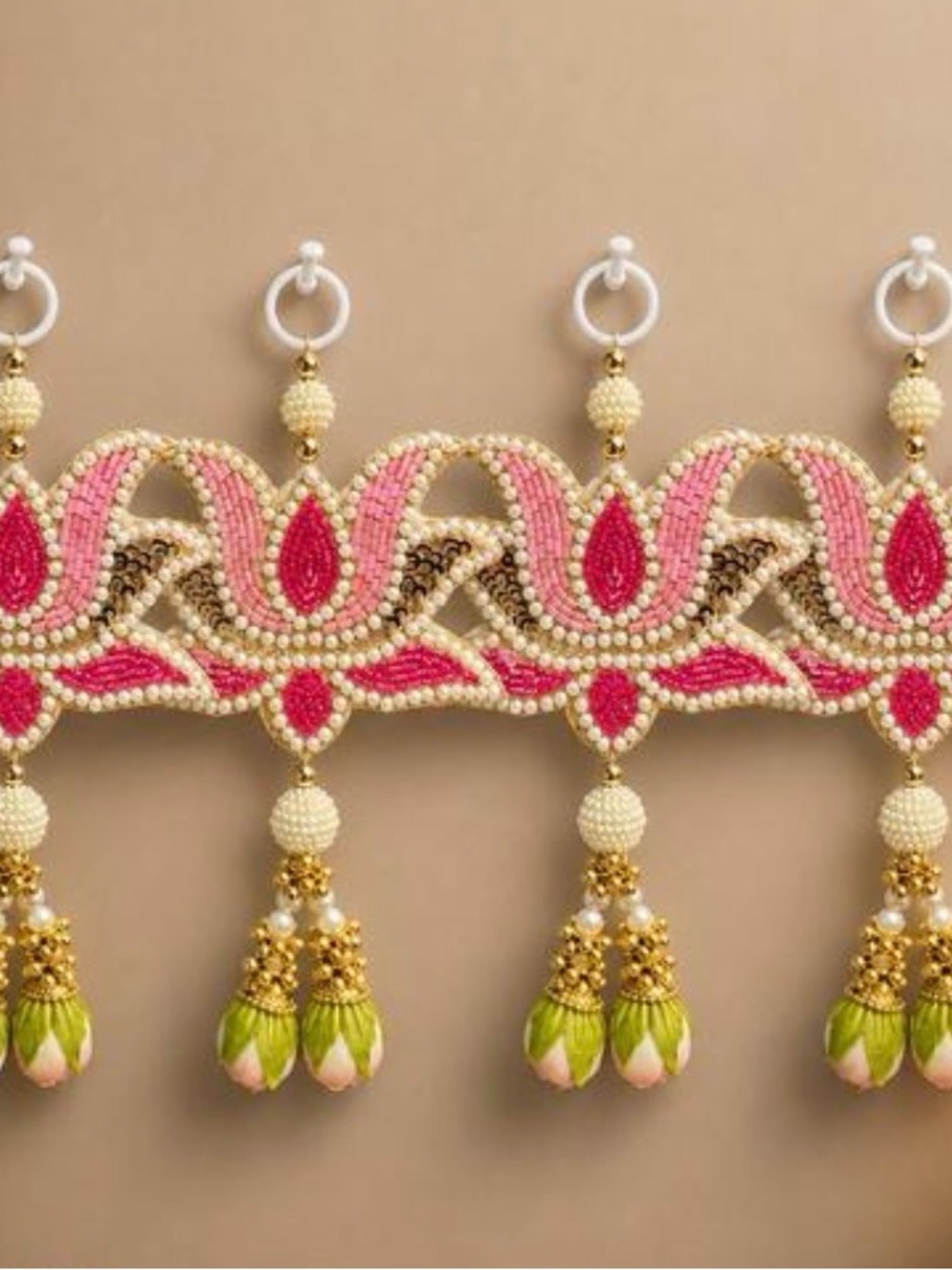 Handcrafted Pink and Gold Beaded decorations with Green Tassels